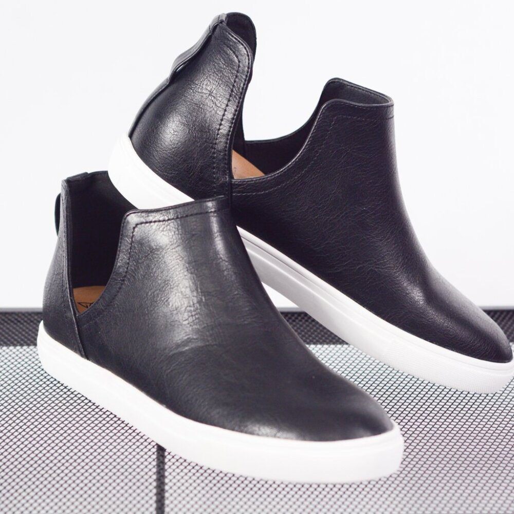 Black sneaker with cutout detail
